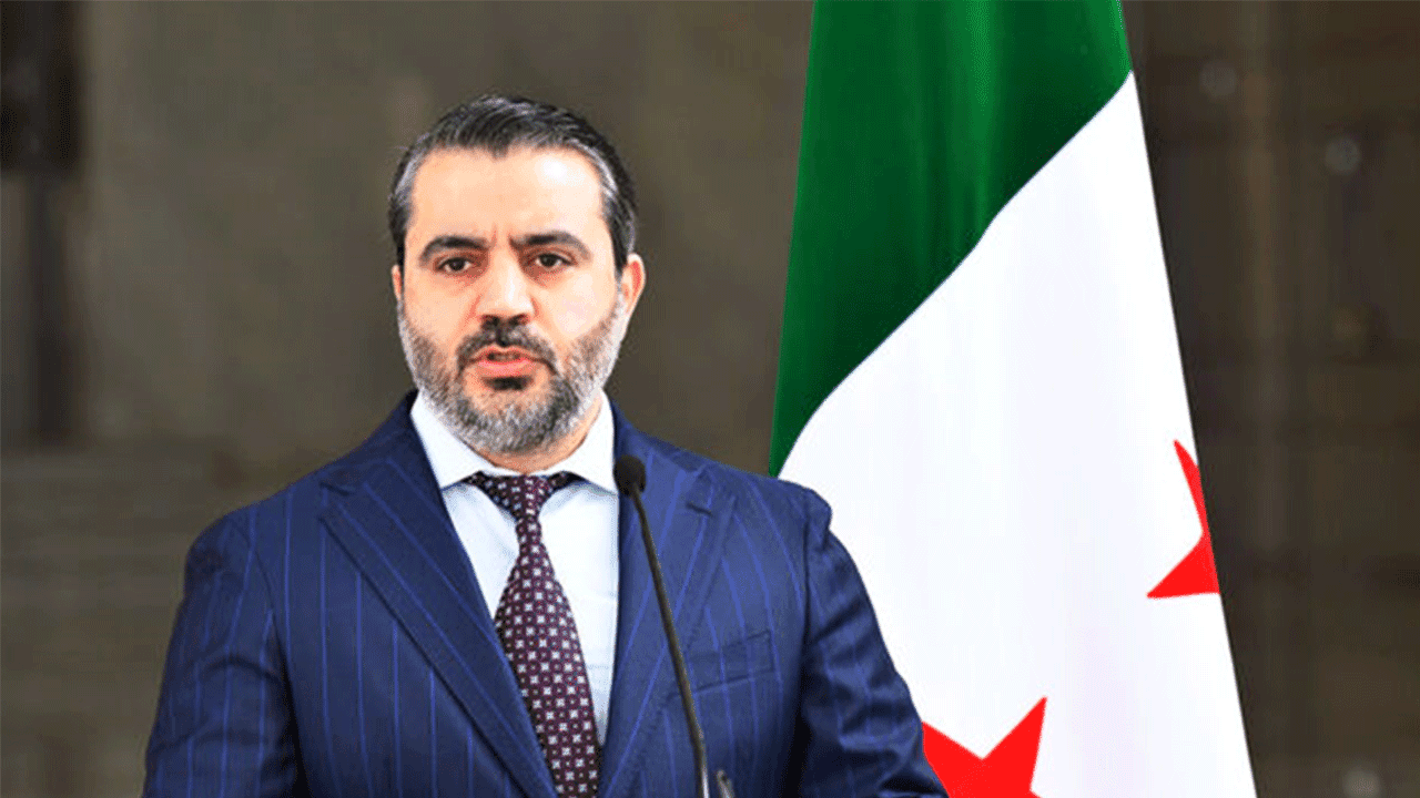 Suriye Dışişleri Bakanı Esad Hasan Şeybani basın toplantısında konuşurken.