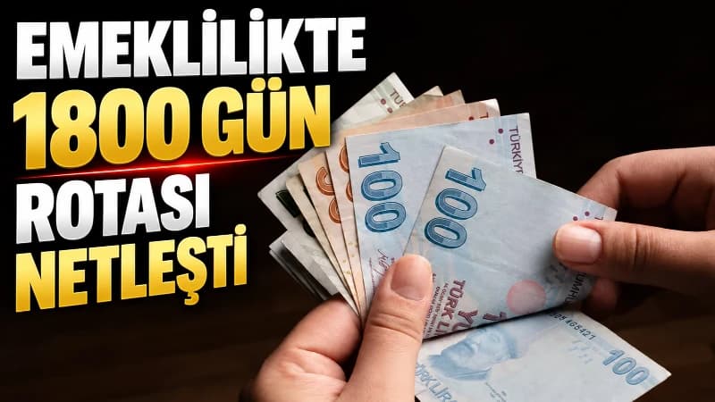 Küçük bir dükkânın tezgâhı önünde duran esnaf elindeki belgeyi inceliyor; arka planda dükkân rafları ve iş yerine ait detaylar görünüyor.
